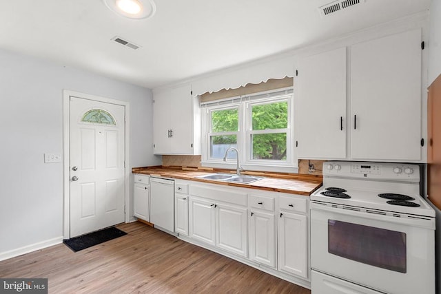 19012 Lahore Rd, Orange, VA 22960 - kitchen with white appliances, white cabinets, light wood finished floors, and tasteful backsplash