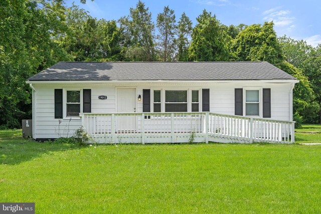19012 Lahore Rd, Orange, VA 22960 - view of front of house with a front lawn, a shingled roof, and view of wooded area
