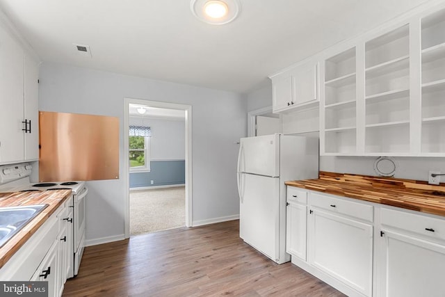 19012 Lahore Rd, Orange, VA 22960 - kitchen featuring white appliances, butcher block countertops, light wood-type flooring, and white cabinets