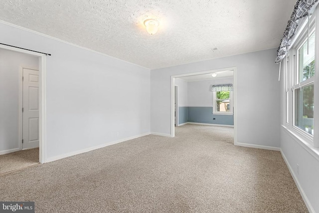 19012 Lahore Rd, Orange, VA 22960 - empty room with carpet and a textured ceiling