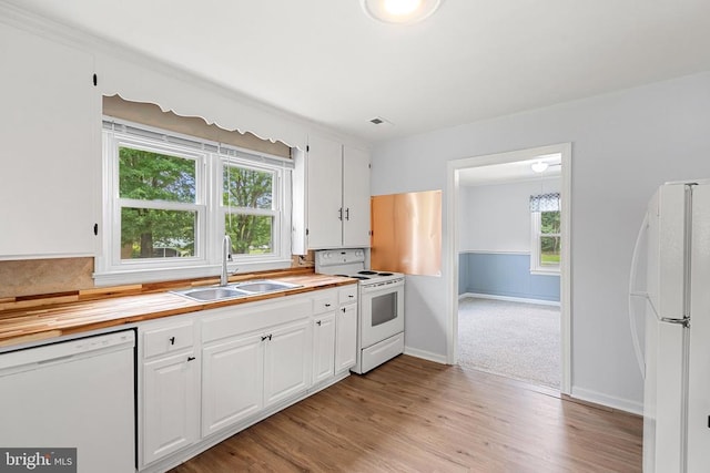 19012 Lahore Rd, Orange, VA 22960 - kitchen featuring white appliances, butcher block countertops, white cabinets, and light wood-style floors