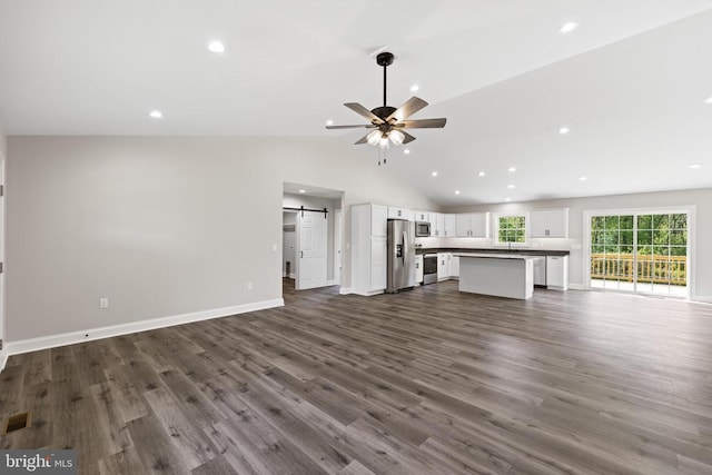 2434 Repton Mill Rd, Aroda, VA 22709 - unfurnished living room featuring a barn door, a ceiling fan, recessed lighting, dark wood-style flooring, and baseboards
