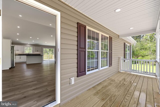 2434 Repton Mill Rd, Aroda, VA 22709 - wooden terrace with covered porch