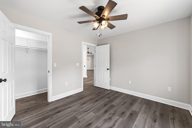 2434 Repton Mill Rd, Aroda, VA 22709 - unfurnished bedroom with dark wood-type flooring, baseboards, a closet, and a ceiling fan