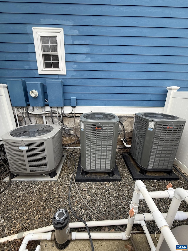 details featuring central AC unit and electric meter