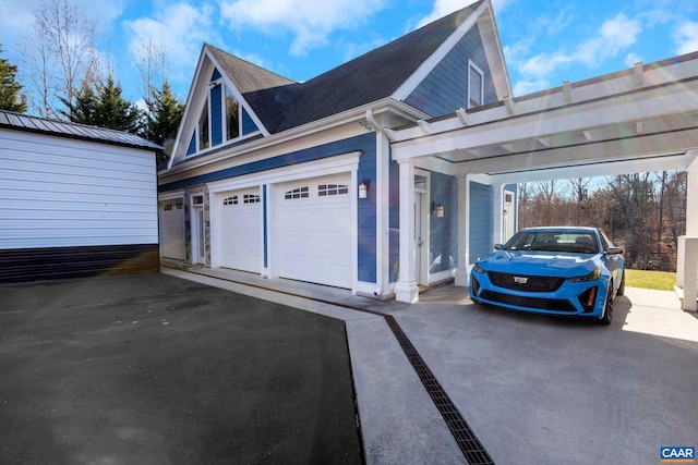 garage with aphalt driveway