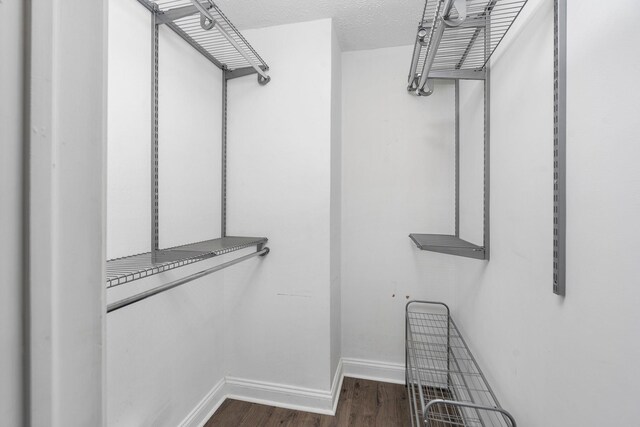 402 Marshall St, Staunton, VA 24401 - spacious closet with dark wood-style flooring