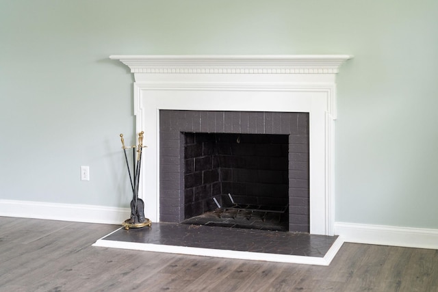 402 Marshall St, Staunton, VA 24401 - detailed view of a fireplace with raised hearth and wood finished floors