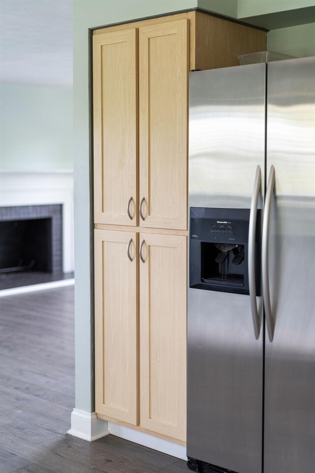 402 Marshall St, Staunton, VA 24401 - kitchen featuring stainless steel refrigerator with ice dispenser, light brown cabinetry, and dark wood-style flooring