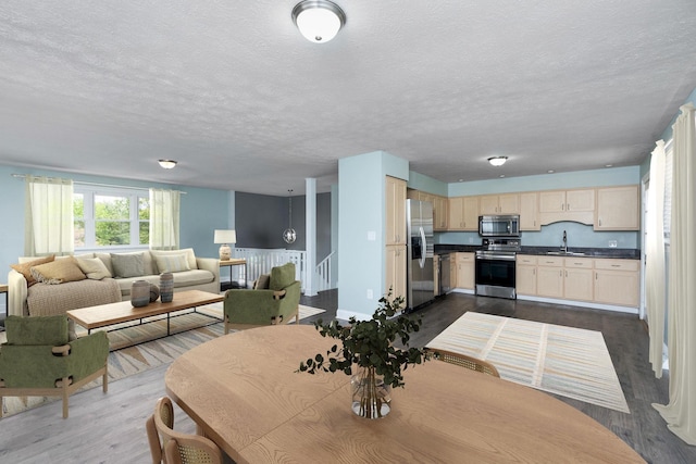 402 Marshall St, Staunton, VA 24401 - dining room featuring a textured ceiling and dark wood-type flooring
