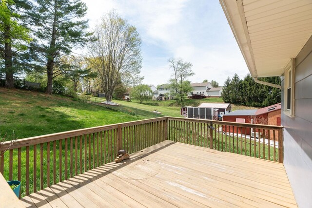 402 Marshall St, Staunton, VA 24401 - wooden terrace featuring a yard, a residential view, and an outbuilding