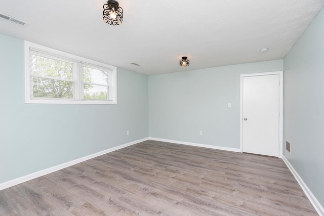 402 Marshall St, Staunton, VA 24401 - empty room featuring wood finished floors and baseboards