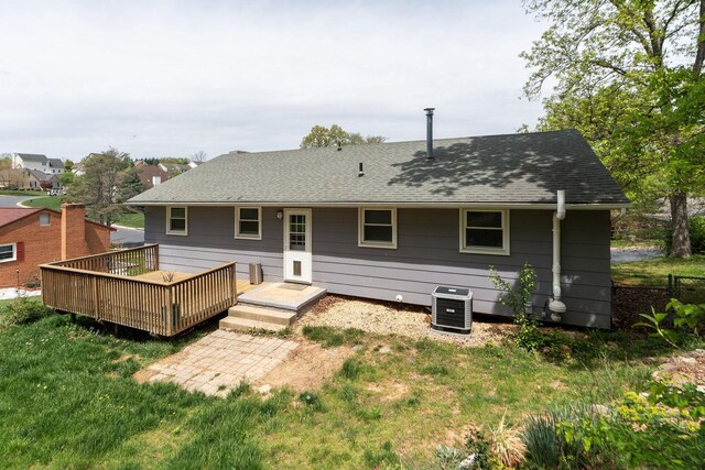 402 Marshall St, Staunton, VA 24401 - rear view of house with central AC unit, a deck, a yard, and a shingled roof