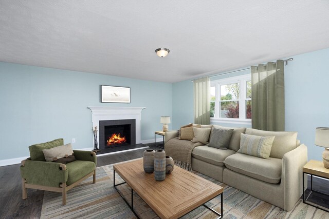 402 Marshall St, Staunton, VA 24401 - living area with wood finished floors and a lit fireplace