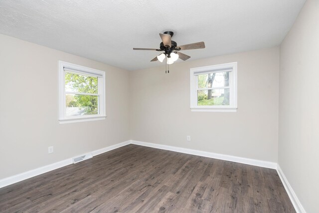 402 Marshall St, Staunton, VA 24401 - unfurnished room with dark wood-style flooring, a ceiling fan, and baseboards