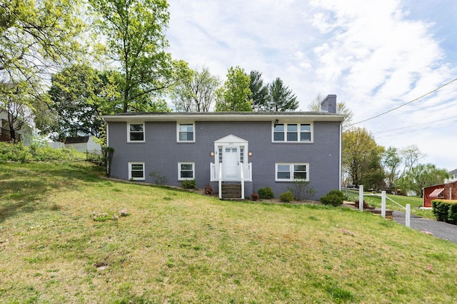 402 Marshall St, Staunton, VA 24401 - bi-level home with a chimney and a front yard