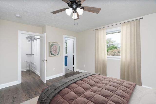 402 Marshall St, Staunton, VA 24401 - bedroom featuring wood finished floors, a textured ceiling, and a ceiling fan