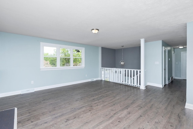 402 Marshall St, Staunton, VA 24401 - spare room with wood finished floors and baseboards