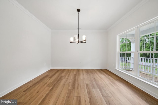 405 Richmond Ave, Mineral, VA 23117 - unfurnished room featuring a chandelier, light wood-style floors, and ornamental molding