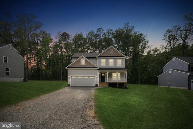 405 Richmond Ave, Mineral, VA 23117 - view of front of house featuring covered porch, gravel driveway, a front yard, and an attached garage