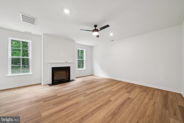 405 Richmond Ave, Mineral, VA 23117 - unfurnished living room featuring light wood-style flooring, ceiling fan, a fireplace with flush hearth, and recessed lighting