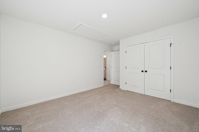 405 Richmond Ave, Mineral, VA 23117 - unfurnished bedroom with attic access, light colored carpet, a closet, and recessed lighting