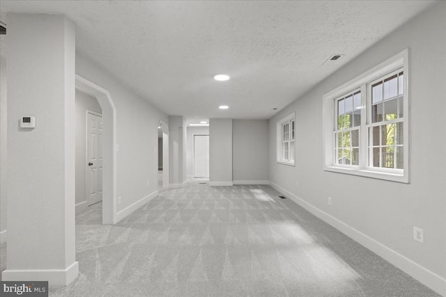 3050 Patriot Ln, Fredericksburg, VA 22408 - spare room with carpet floors, a textured ceiling, and recessed lighting