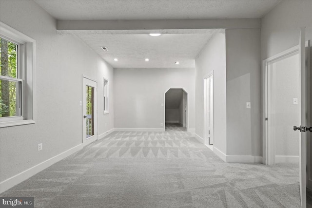 3050 Patriot Ln, Fredericksburg, VA 22408 - hallway with carpet flooring, arched walkways, and recessed lighting