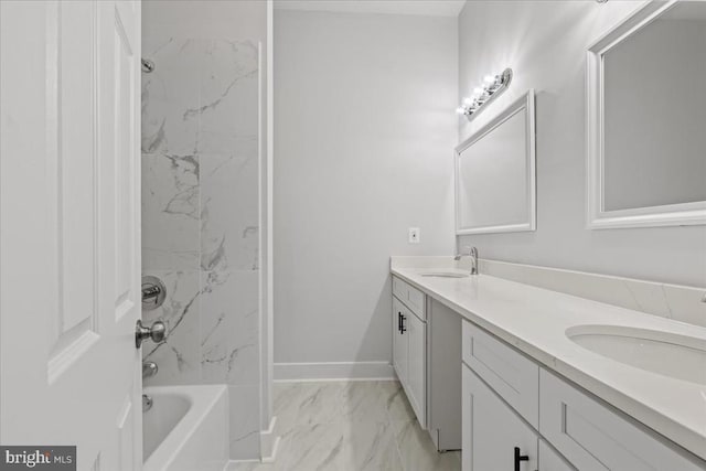 3050 Patriot Ln, Fredericksburg, VA 22408 - bathroom with marble look tile flooring, double vanity, and bathing tub / shower combination