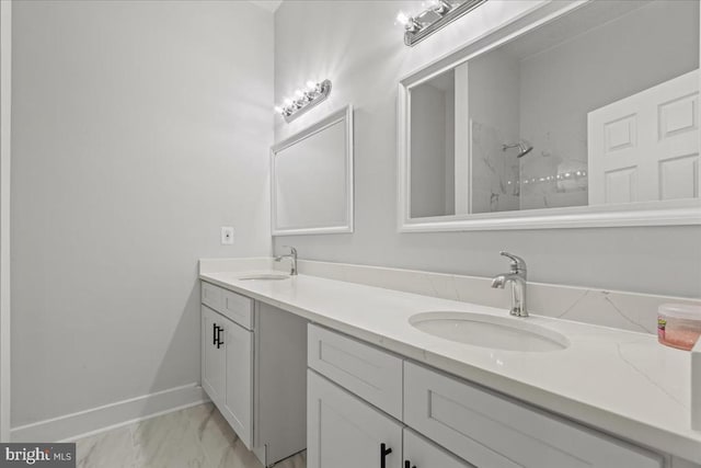 3050 Patriot Ln, Fredericksburg, VA 22408 - bathroom with marble look tile flooring, double vanity, and a marble finish shower