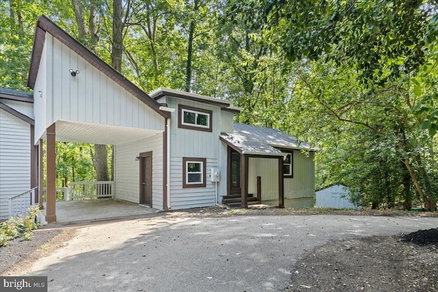 3050 Patriot Ln, Fredericksburg, VA 22408 - view of front facade featuring asphalt driveway, a carport, and entry steps