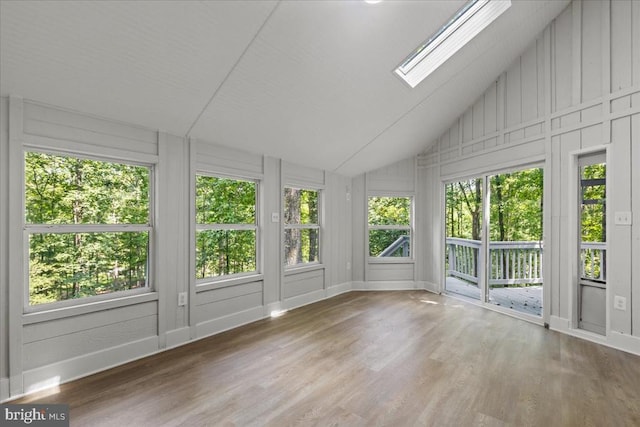 3050 Patriot Ln, Fredericksburg, VA 22408 - unfurnished sunroom featuring vaulted ceiling, wood finished floors, and a skylight