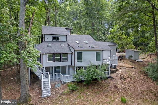 3050 Patriot Ln, Fredericksburg, VA 22408 - rear view of house with stairway, a shingled roof, a storage shed, and a porch