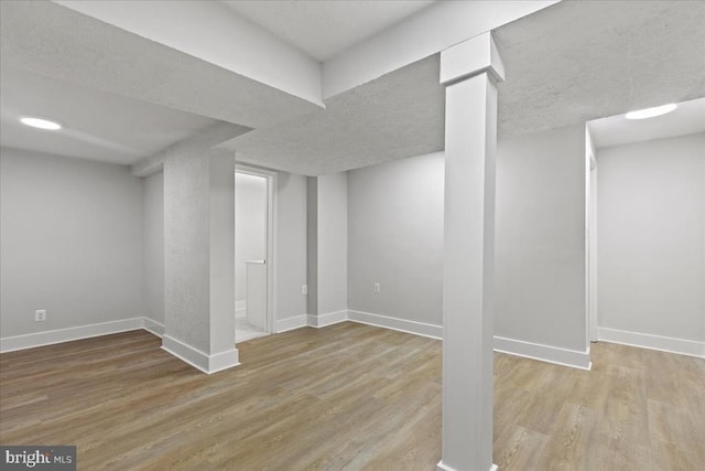 3050 Patriot Ln, Fredericksburg, VA 22408 - finished below grade area featuring baseboards and wood finished floors