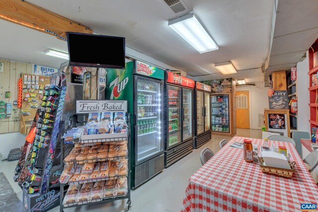 3340 James River Rd, Howardsville, VA 24562 - interior space featuring finished concrete flooring and visible vents