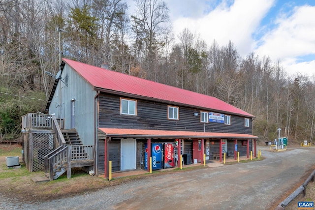 3340 James River Rd, Howardsville, VA 24562 - view of front of house featuring metal roof, stairs, and cooling unit