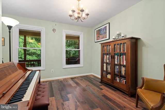 11332 Brinker Ct, Culpeper, VA 22701 - sitting room featuring dark wood finished floors, plenty of natural light, a chandelier, and baseboards