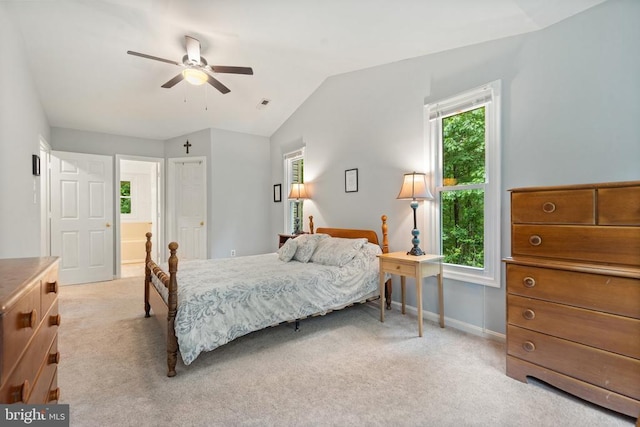 11332 Brinker Ct, Culpeper, VA 22701 - bedroom with light carpet, baseboards, vaulted ceiling, a ceiling fan, and connected bathroom