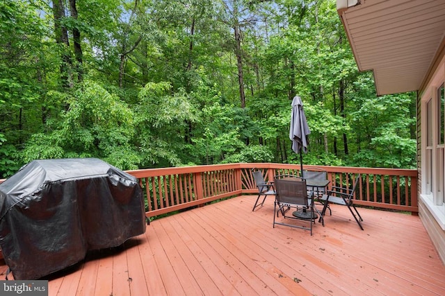 11332 Brinker Ct, Culpeper, VA 22701 - wooden terrace with outdoor dining space, area for grilling, and a forest view