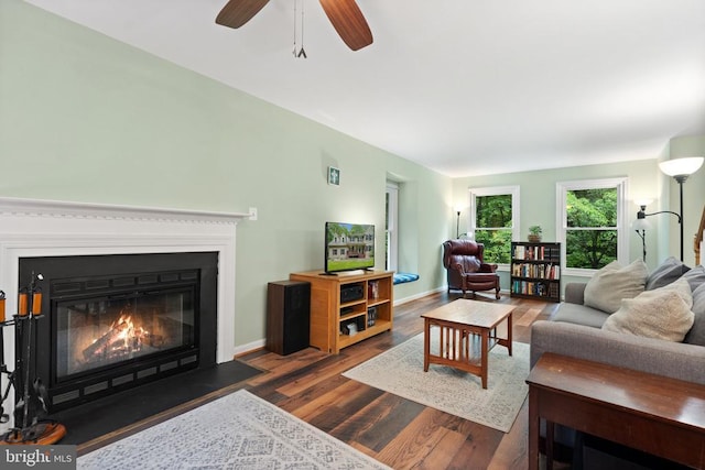 11332 Brinker Ct, Culpeper, VA 22701 - living area featuring a fireplace with flush hearth, wood finished floors, ceiling fan, and baseboards