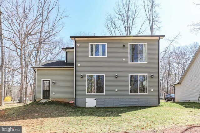 105 Chesterfield Ct, Locust Grove, VA 22508 - rear view of property featuring a lawn