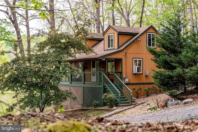 266 Park View Ln, Shenandoah, VA 22849 - rustic home with covered porch, stairs, and a shingled roof