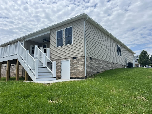 81 Meriwether Cir, Stuarts Draft, VA 24477 - back of house with a ceiling fan, stairway, cooling unit, a lawn, and crawl space