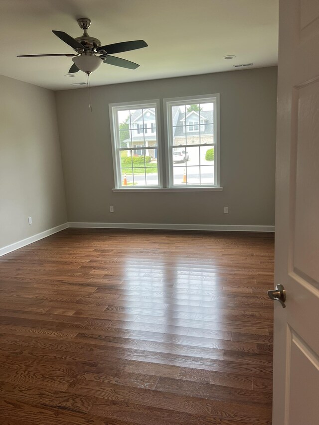 81 Meriwether Cir, Stuarts Draft, VA 24477 - spare room with ceiling fan, dark wood-style flooring, and baseboards