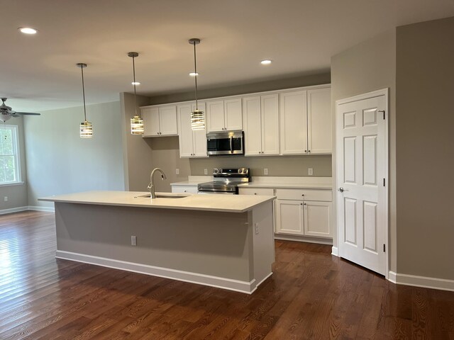 81 Meriwether Cir, Stuarts Draft, VA 24477 - kitchen with stainless steel appliances, a sink, white cabinets, light countertops, and recessed lighting