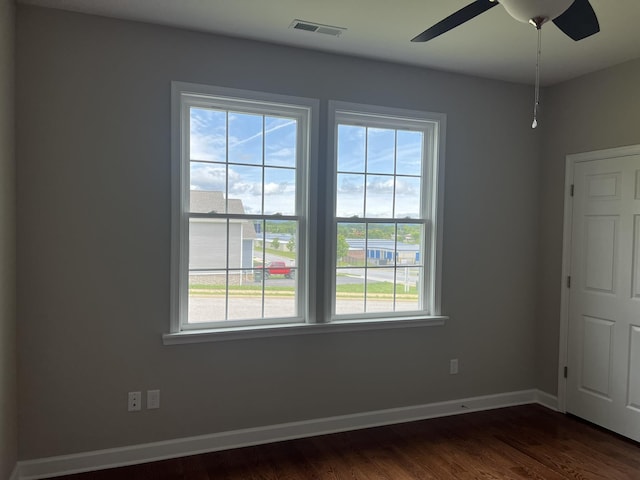 81 Meriwether Cir, Stuarts Draft, VA 24477 - unfurnished room featuring plenty of natural light, a ceiling fan, dark wood-type flooring, and baseboards