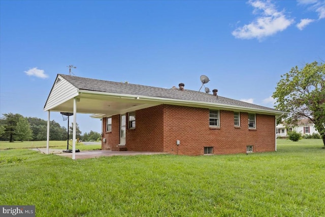 4970 Ridge Rd, Spotsylvania, VA 22551 - view of side of home with a lawn, brick siding, and a patio area