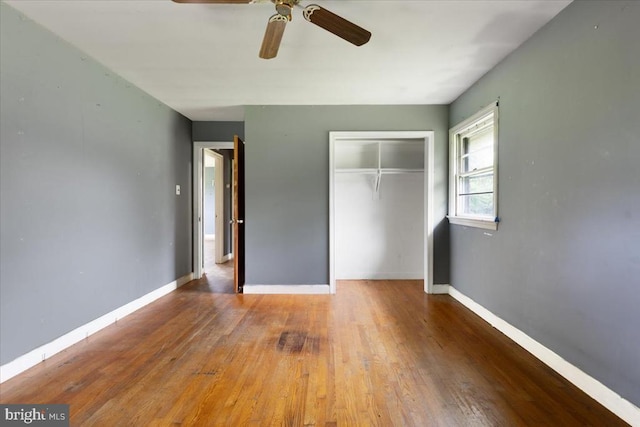 4970 Ridge Rd, Spotsylvania, VA 22551 - unfurnished bedroom with a closet, wood-type flooring, and ceiling fan
