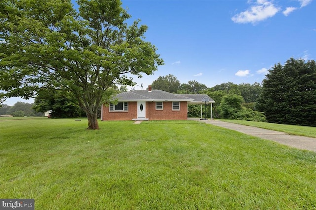 4970 Ridge Rd, Spotsylvania, VA 22551 - ranch-style home featuring driveway, a front yard, a carport, brick siding, and a chimney