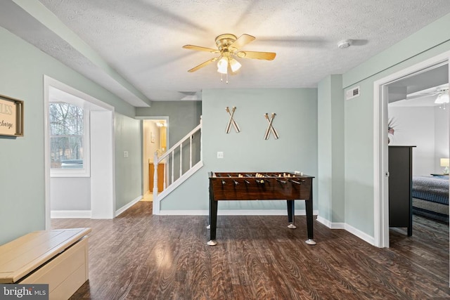 11104 Piney Forest Rd, Bumpass, VA 23024 - entrance foyer featuring a ceiling fan, wood finished floors, a textured ceiling, stairs, and baseboards